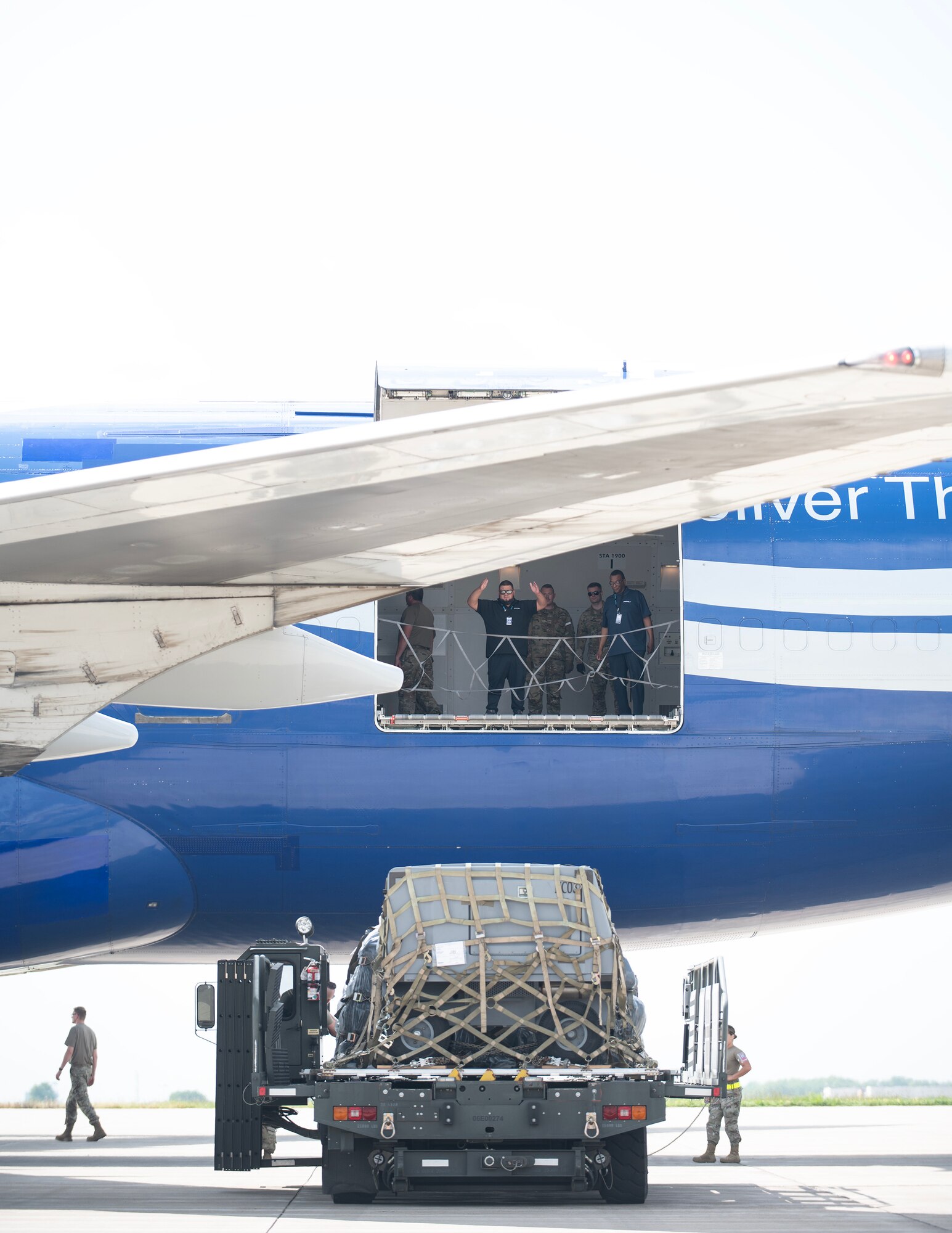 U.S. Air Force Airmen from the 133rd Aerial Transportation Function prepare to load a Boeing 747 transport aircraft with cargo in St. Paul, Minn., Aug. 24, 2023.