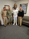 Pictured are officers from the Supervisor of Salvage and Diving (SUPSALV) Reserve Heavy Lift Team, (Left to right) Cmdr. Manny Sayoc, Capt. Sal Suarez, Lt Cmdr. Bomono “Bones” Emessiene, and Capt. Elmer Roman, after Emessiene qualified as a Heavy Lift Project Officer.