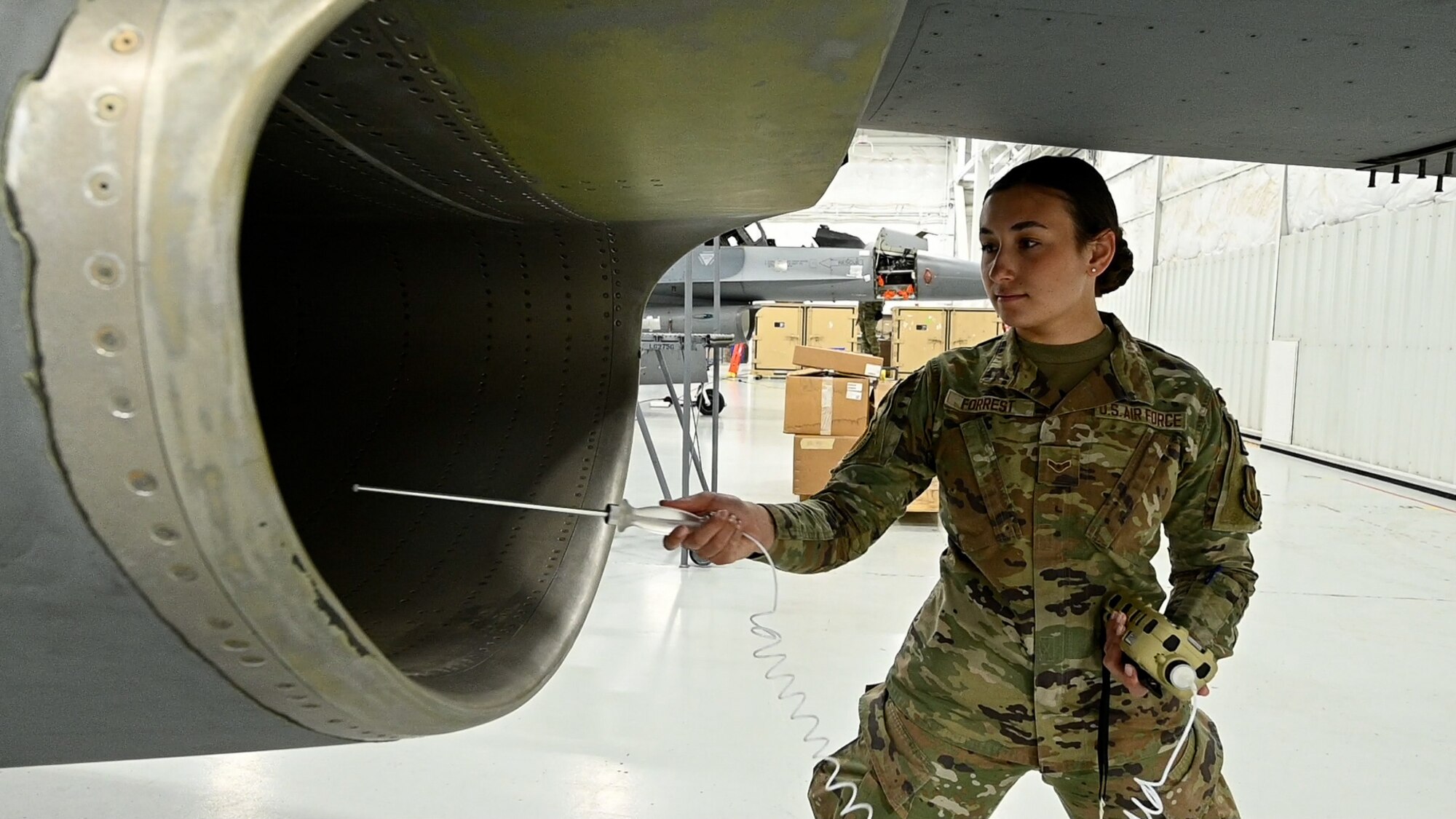 Airman 1st Class Kaylee Forrest, 75th Medical Group, demonstrates measuring a confined space atmosphere for a train-the-trainer course at Hill Force Base, Utah, April, 2023. The 75th ABW Occupational Safety Office developed the training course with a multi-disciplinary team in response to a Air Force Safety Center tasking. The course was the first of its kind to be adopted at the major command level and sets the standard for confined space entry across Air Force Materiel Command. (U.S. Air Force photo by R. Nial Bradshaw)