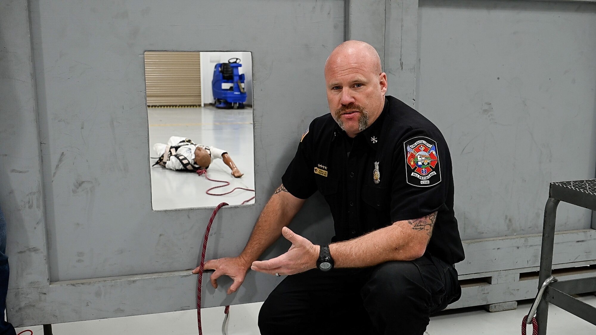 Josh Jex, Hill Fire and Safety Services assistant chief, demonstrates confined space rescue procedures for a train-the-trainer course at Hill Air Force Base, Utah, April 4, 2023. The 75th ABW Occupational Safety Office developed the training course with a multi-disciplinary team in response to a Air Force Safety Center tasking. The course was the first of its kind to be adopted at the major command level and sets the standard for confined space entry across Air Force Materiel Command. (U.S. Air Force photo by R. Nial Bradshaw)