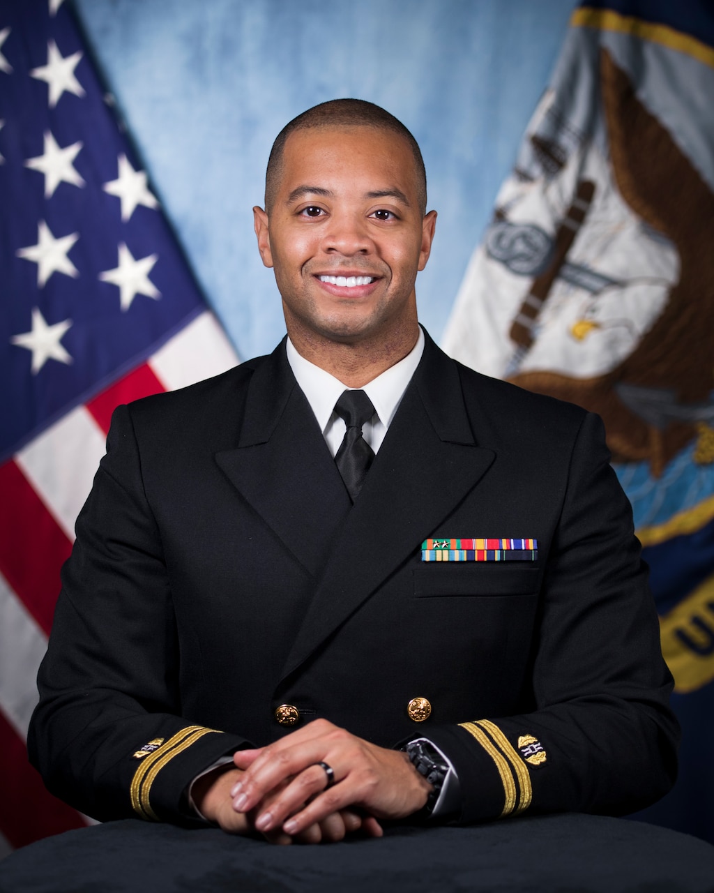 Lt. Jere'l Hough, assistant legal counsel to the Chief of Naval Personnel, poses for an official portrait at Naval Support Facility Arlington.