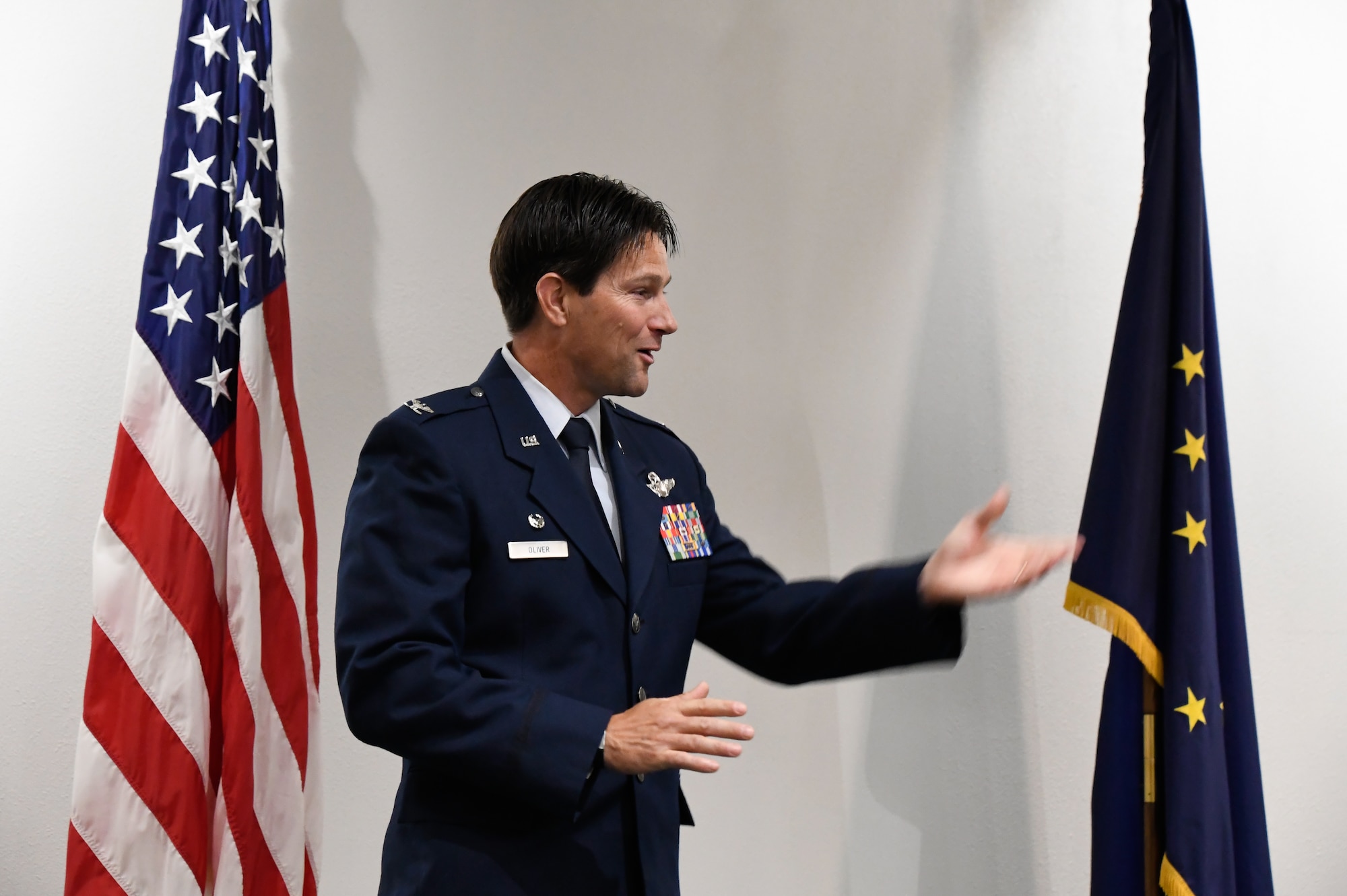 U.S. Air Force Col. Ronald Oliver, 168th Wing Deputy Commander, addresses the audience during a change of command ceremony August 5, 2023, at Eielson Air Force Base, Alaska. A change of command ceremony is a military tradition representing the formal transfer of responsibility of a unit from one commanding officer to another. (U.S. Air National Guard photo by Senior Master Sgt. Julie Avey)