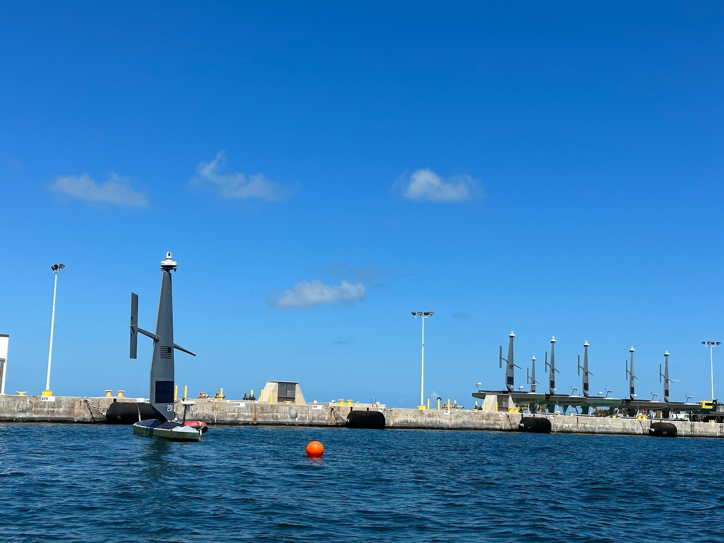 Commercial operators deploy Saildrone Voyager Unmanned Surface Vessels (USVs) out to sea in the initial steps of U.S. 4th Fleet’s Operation Windward Stack during a launch from Naval Air Station Key West’s Mole Pier and Truman Harbor, Sept. 13, 2023. Operation Windward Stack is part of 4th Fleet’s unmanned integration campaign, which provides the Navy a region to experiment with and operate unmanned systems in a permissive environment, develop Tactics, Techniques, and Procedures (TTPs) against near-peer competitors, and refine manned and unmanned Command and Control (C2) infrastructure, all designed to move the Navy to the hybrid fleet.