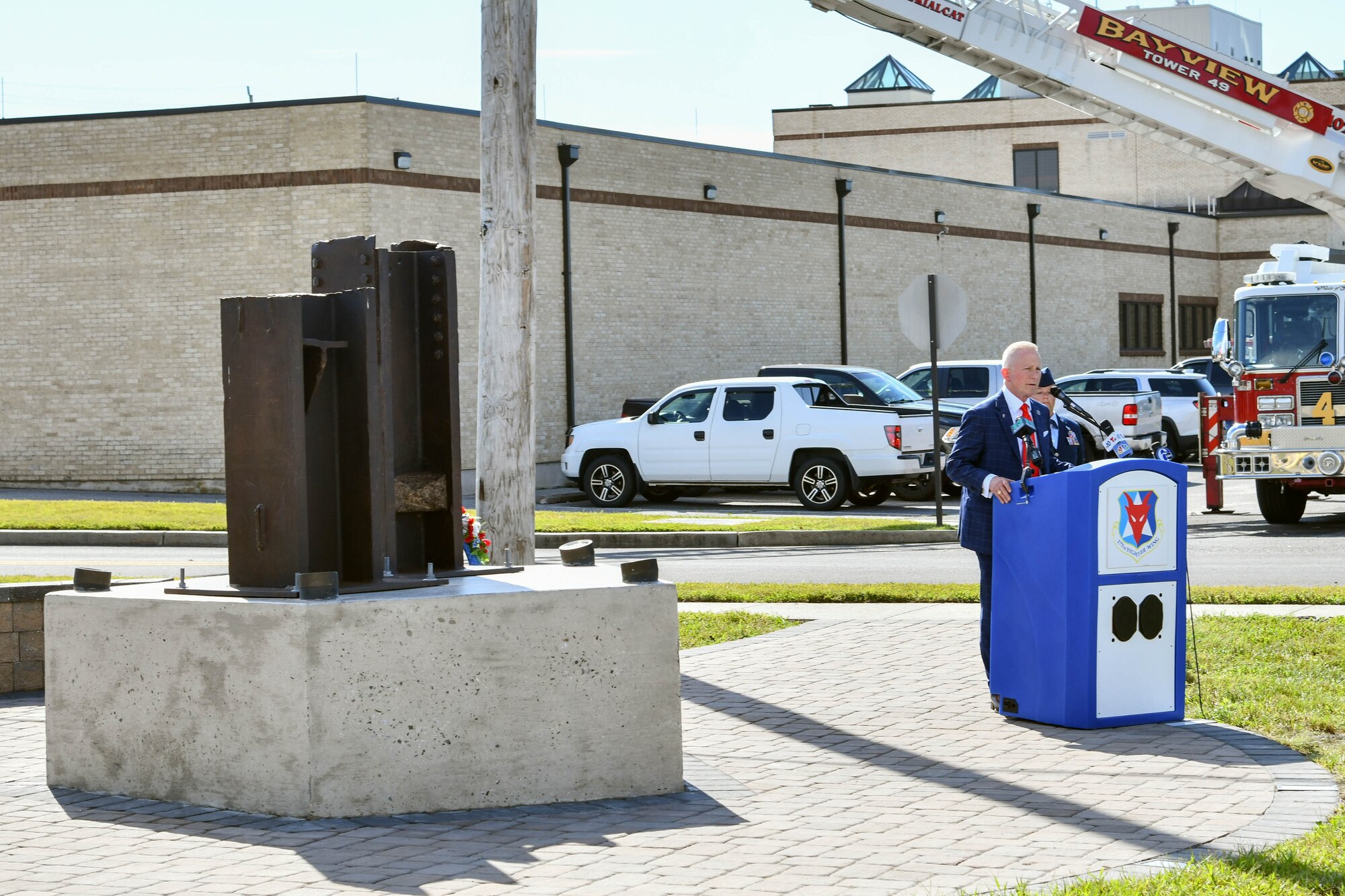 A photo of Congressman Jeff Van Drew speaking during a 9/11 memorial dedication ceremony.