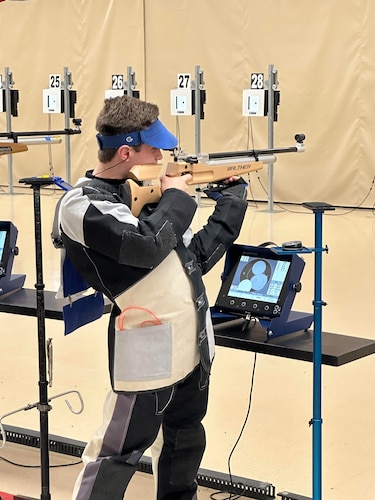 AFJROTC cadet competes in the National JROTC Air Rifle Championship.