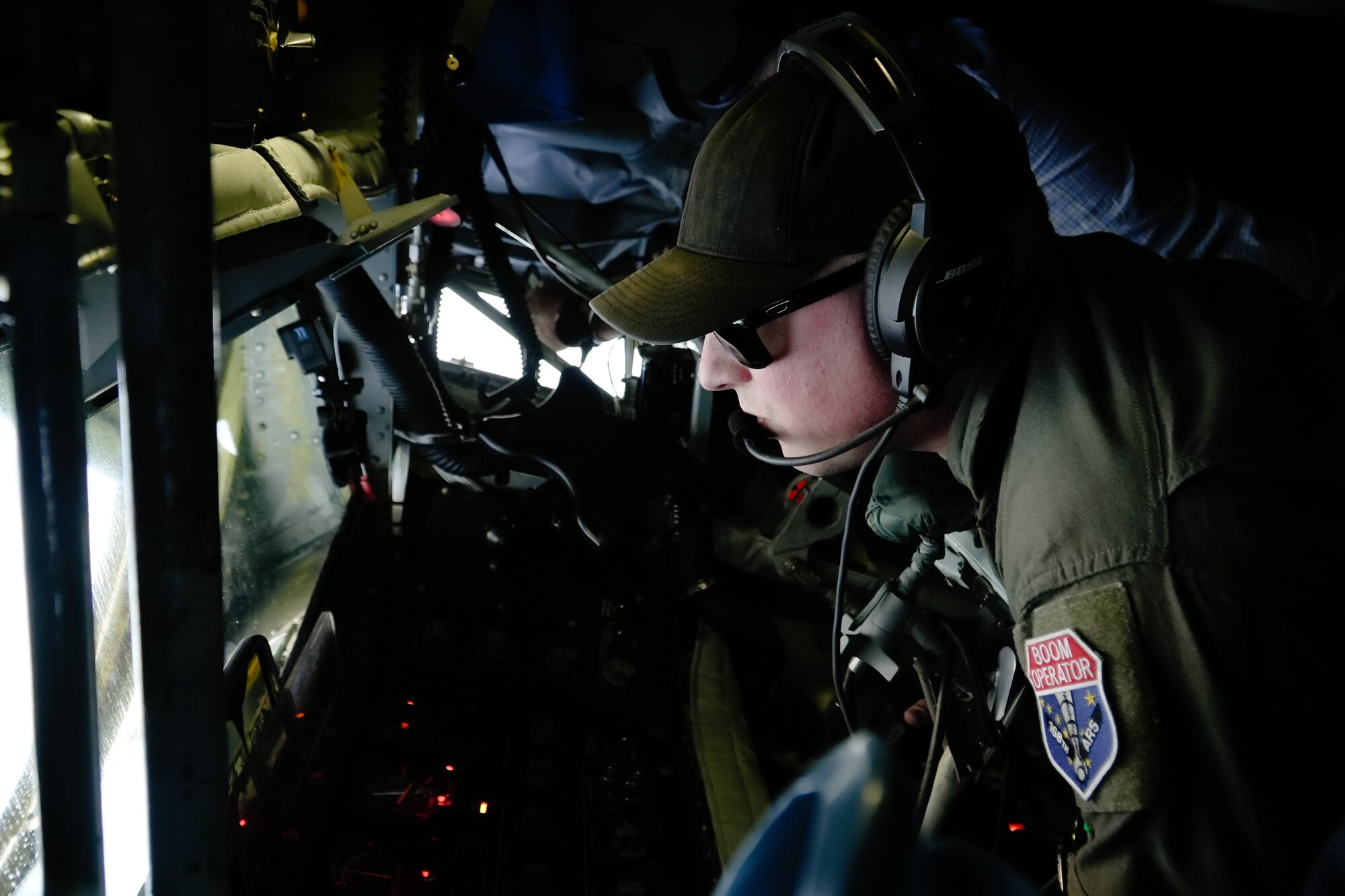 A 168th Operations Group Boom Operator operates the refueling boom aboard a 168th Wing KC-135 Stratotanker