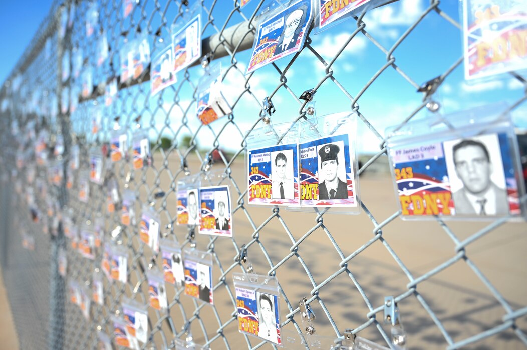Badges are displayed at the Louis F. Garland Department of Defense Fire Academy after the 5K run during the 11th Annual Blood, Sweat, and Stairs event at the Louis F. Garland Department of Defense Fire Academy, Goodfellow Air Force Base, Texas, Sept. 9, 2023. Each participant of the 5K wore a badge with a name and photo of one of 343 first responders that perished during 9/11. (U.S. Air Force photo by Airman 1st Class Madison Collier)