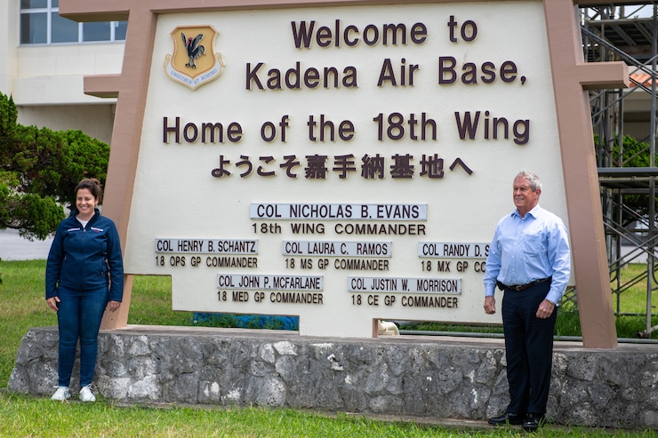 U.S. Reps Elise Stefanik and Joe Wilson posing next to a welcome sign