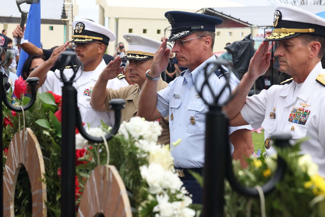 Military leaders pay their respects after laying wreaths during the 9/11 ceremony at Two Lovers Point in Tamuning, Guam, Sept. 11, 2023. The ceremony consisted of the laying of wreaths in remembrance of the nearly 3,000 lives lost on the tragic day of Sept. 11, 2001. This year marks the 22nd anniversary. Members of Guam government, first responders, and military leaders gathered to remember and share their stories of that day. (U.S. Marine Corps photo by Lance Cpl. Garrett Gillespie)