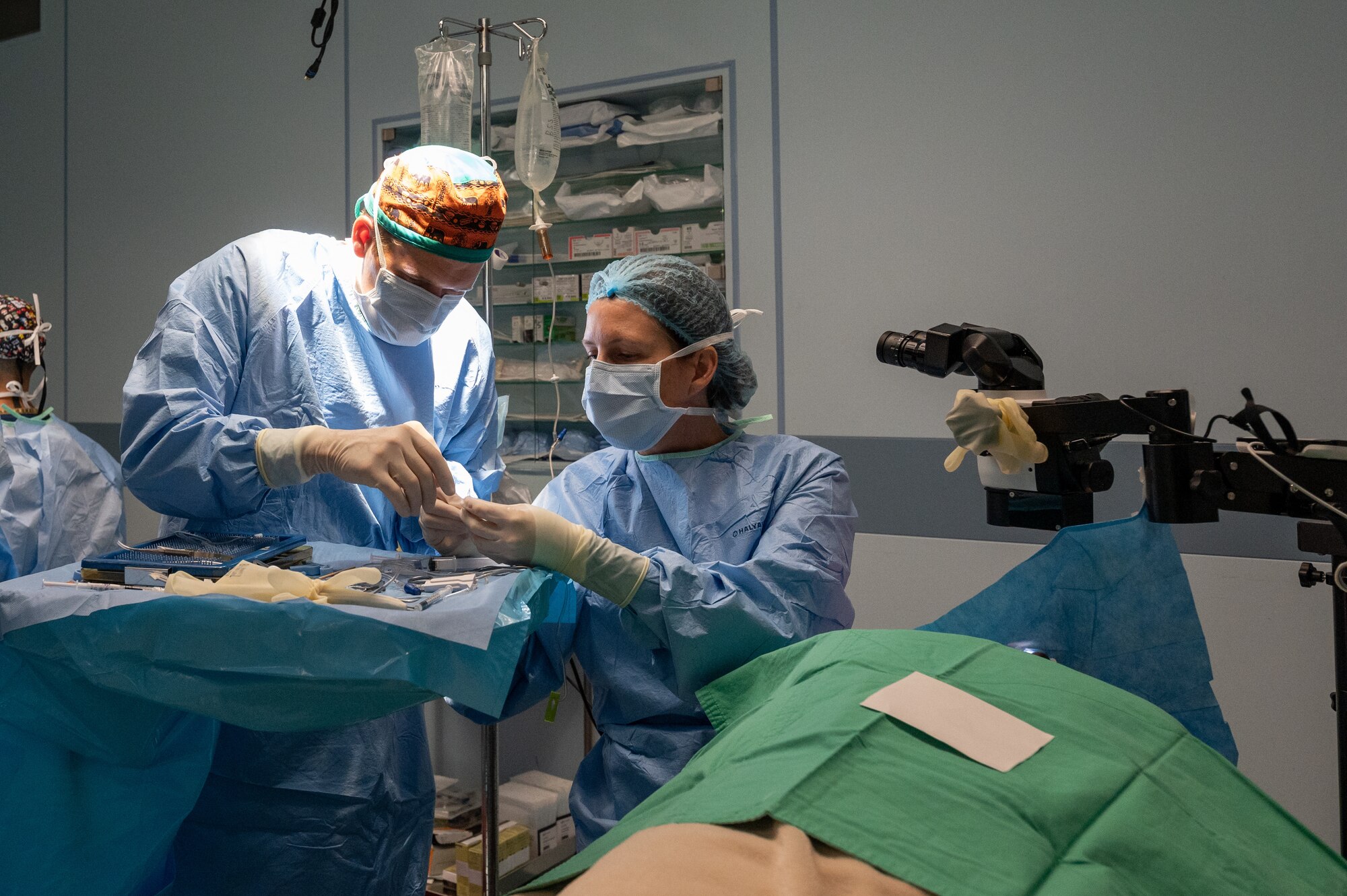 Two ophthalmologists perform a manual small incision cataract surgery on a patient in Santiago de Veraguas, Panama.