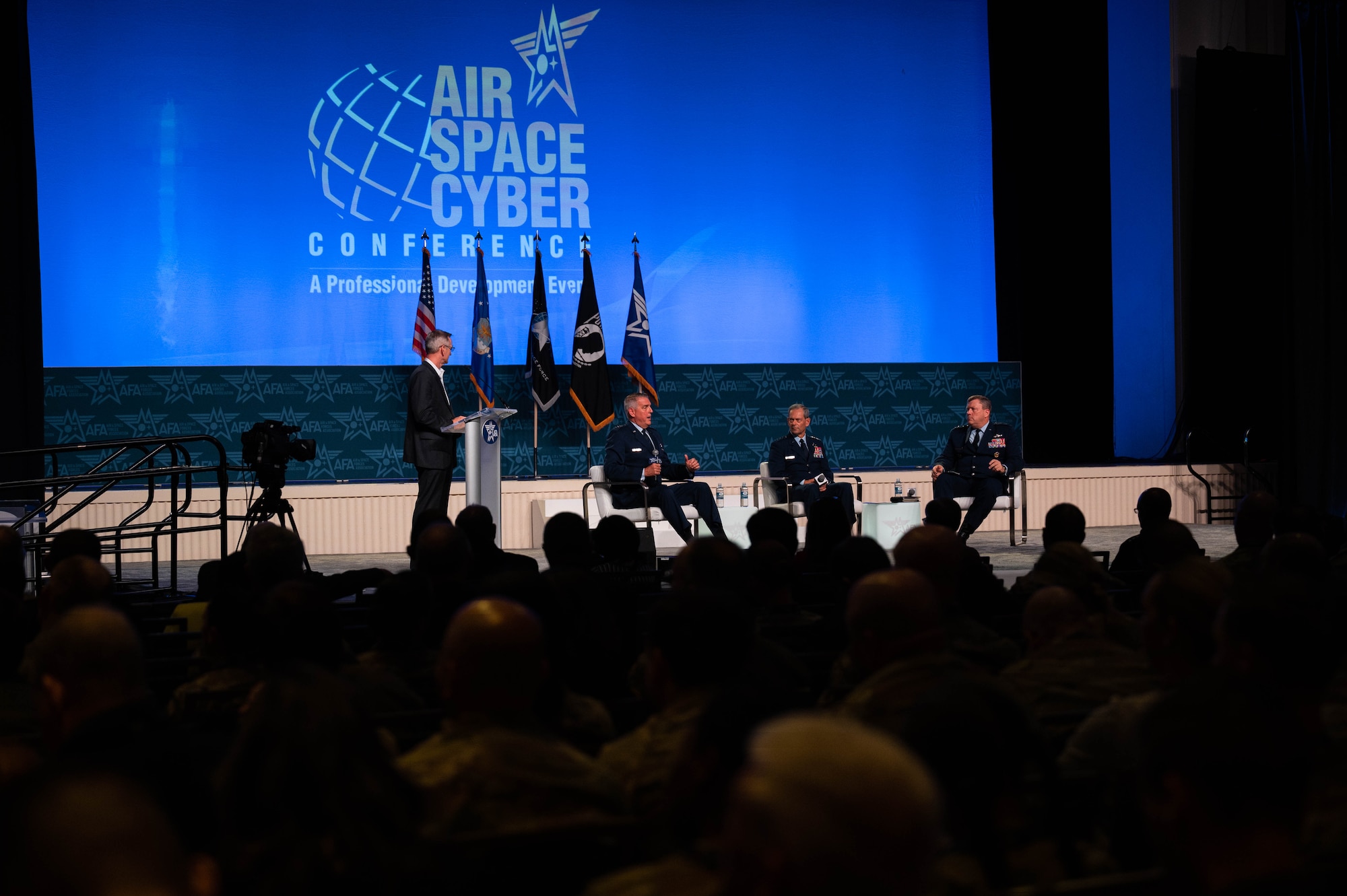 Gen. Mike Minihan, Commander, Air Mobility Command spoke on a panel titled "Ready to Compete, Fight and Win in the Indo-Pacific" during the Air and Space Force Association Conference, Sept. 13, 2023. Gen. Kenneth Wilsbach, Commander, Pacific Air Forces and Gen. Tony Bauernfeind, Commander, Air Force Special Operations Command, also participated in the discussion. (U.S. Air Force photo by Rachel Sansano)