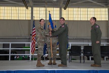 Col. Batterton hands 192nd Wing guidon to Brig. Gen. Jumper.