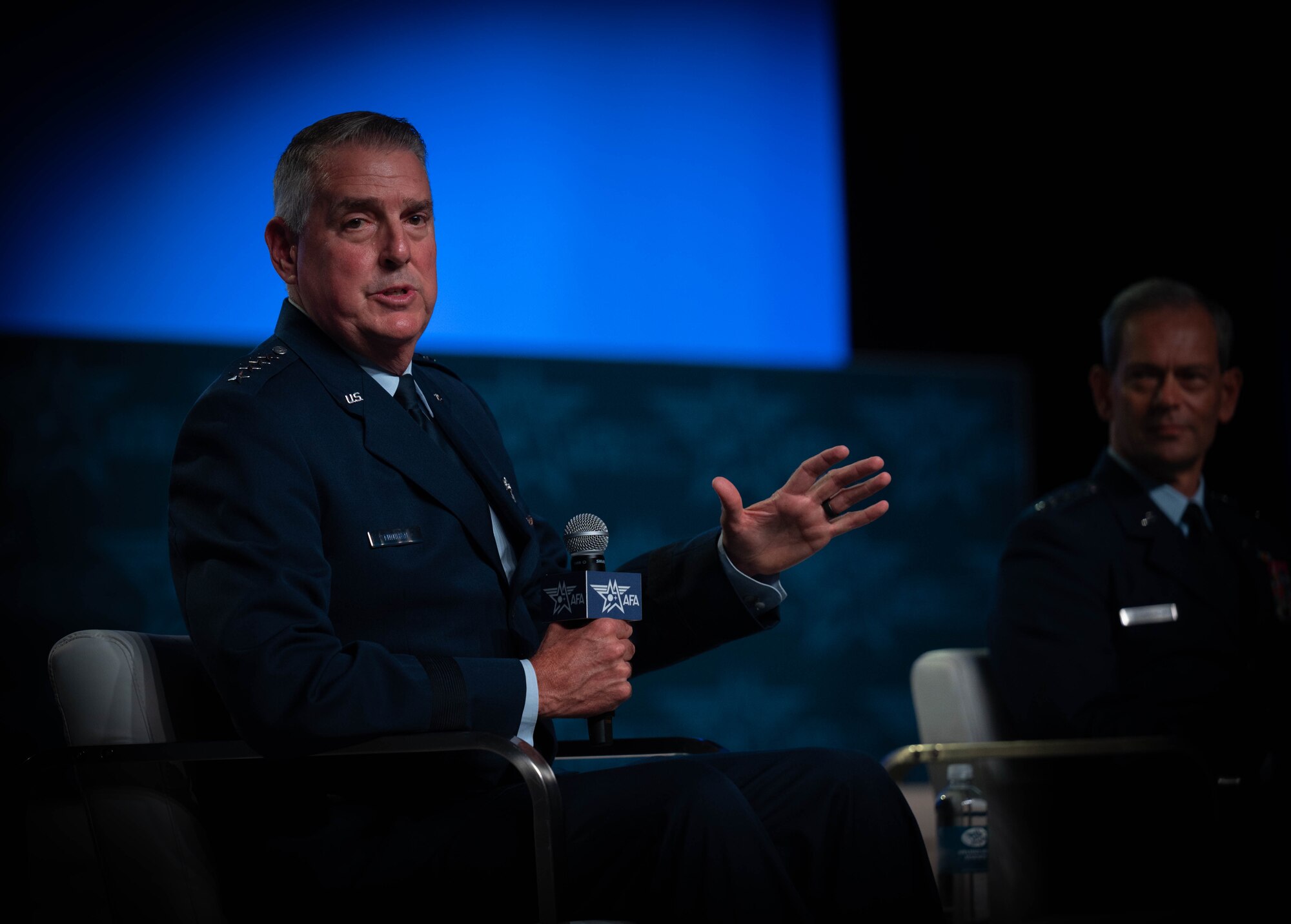 Gen. Mike Minihan, Commander, Air Mobility Command spoke on a panel titled "Ready to Compete, Fight and Win in the Indo-Pacific" during the Air and Space Force Association Conference, Sept. 13, 2023. Gen. Kenneth Wilsbach, Commander, Pacific Air Forces and Gen. Tony Bauernfeind, Commander, Air Force Special Operations Command, also participated in the discussion. (U.S. Air Force photo by Rachel Sansano)