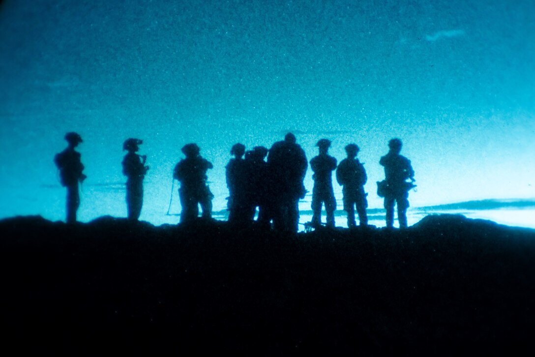 U.S. Marines assigned to Alpha Company, Battalion Landing Team 1/5, 15th Marine Expeditionary Unit, wait to begin a low-light unknown distance rifle range during Realistic Urban Training exercise at Yuma Proving Grounds, Arizona, Aug. 16, 2023. RUT is a land-based predeployment exercise which enhances the integration and collective capability of the Marine Air-Ground Task Force while providing the 15th MEU an opportunity to train and execute operations in an urban environment. (U.S. Marine Corps photo by Lance Cpl. Peyton Kahle)