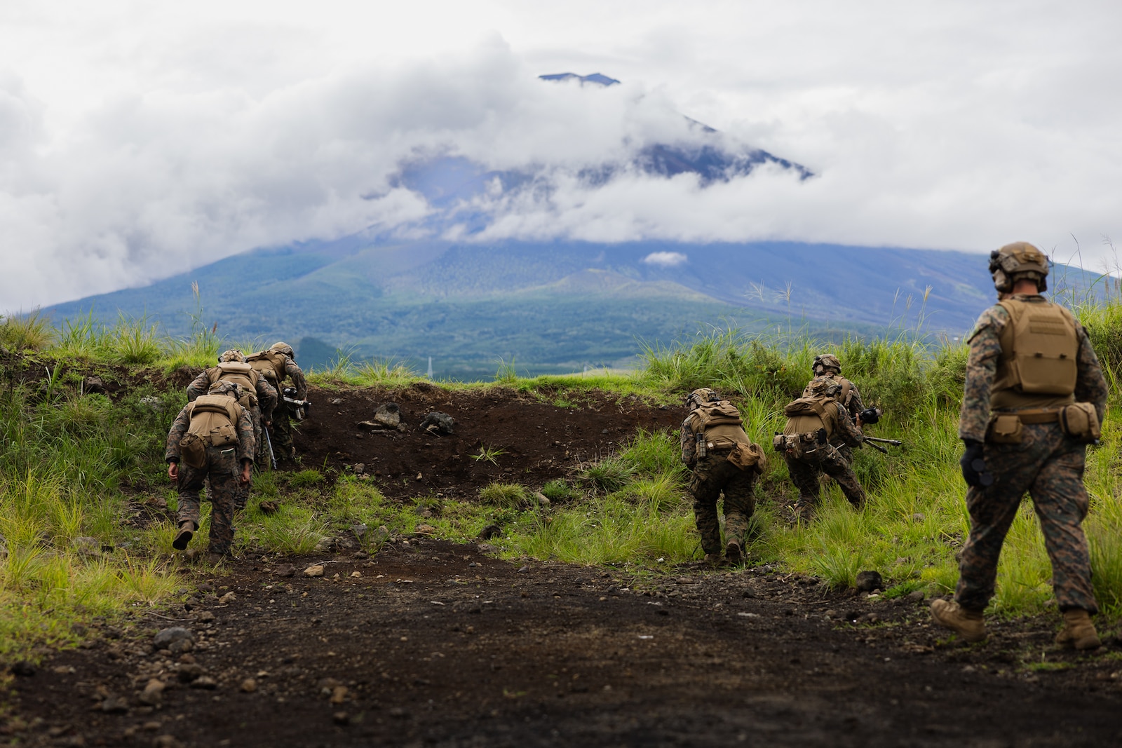 U.S. Marines maneuver to a concealed position during Fuji Viper 23.3 at Combined Arms Training Center Camp Fuji, Japan, Sep. 4, 2023. Fuji Viper is an annual exercise that enables Marines operating in Japan the opportunity to conduct combined arms live-fire training and maintain operational readiness, tactical proficiency, and lethality within the first island chain. 3d Battalion, 5th Marines is currently forward deployed in the Indo-Pacific under 4th Marines, 3d Marine Division as part of the Unit Deployment Program.