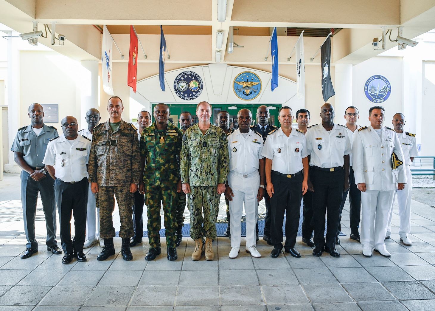 NAPLES, Italy – U.S. Navy Adm. Stuart B. Munsch (center), commander of U.S. Naval Forces Europe and Africa, stands attendees of Maritime Security Working Group for a group photo at the NAVEUR-NAVAF Headquarters, in Naples, Italy, Sept. 12, 2023. The purpose of the MSWG is to understand the requirements of African partner nations for capacity building, in key areas such as maritime domain awareness, operational analysis, maritime professionalism, law enforcement, intelligence gathering, and response and interdiction operations. (U.S. Navy photo by Mass Communication Specialist 1st Class Cameron C. Edy)