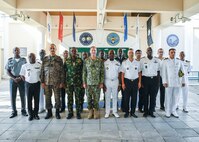 NAPLES, Italy – U.S. Navy Adm. Stuart B. Munsch (center), commander of U.S. Naval Forces Europe and Africa, stands attendees of Maritime Security Working Group for a group photo at the NAVEUR-NAVAF Headquarters, in Naples, Italy, Sept. 12, 2023. The purpose of the MSWG is to understand the requirements of African partner nations for capacity building, in key areas such as maritime domain awareness, operational analysis, maritime professionalism, law enforcement, intelligence gathering, and response and interdiction operations. (U.S. Navy photo by Mass Communication Specialist 1st Class Cameron C. Edy)