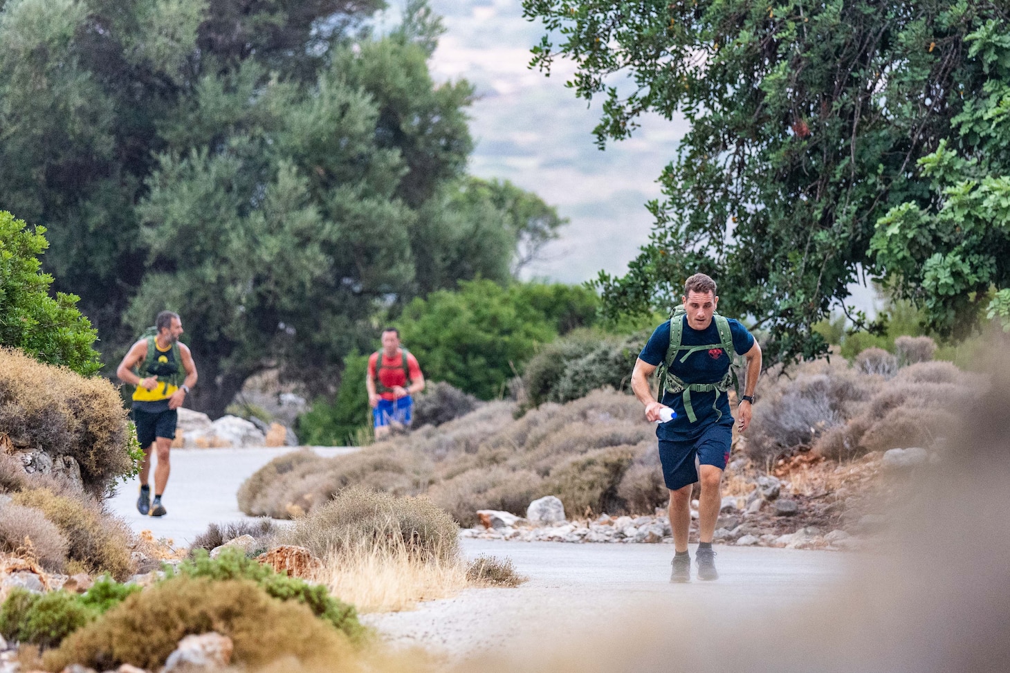 Competitors affiliated with Navy Support Activity Souda Bay, NATO and Hellenic armed forces take part in a 10.4-kilometer hike as part of the 20th Eco-Challenge event hosted by NSA Souda Bay and organized and executed by the Morale, Welfare and Recreation team on Sept. 9, 2023.