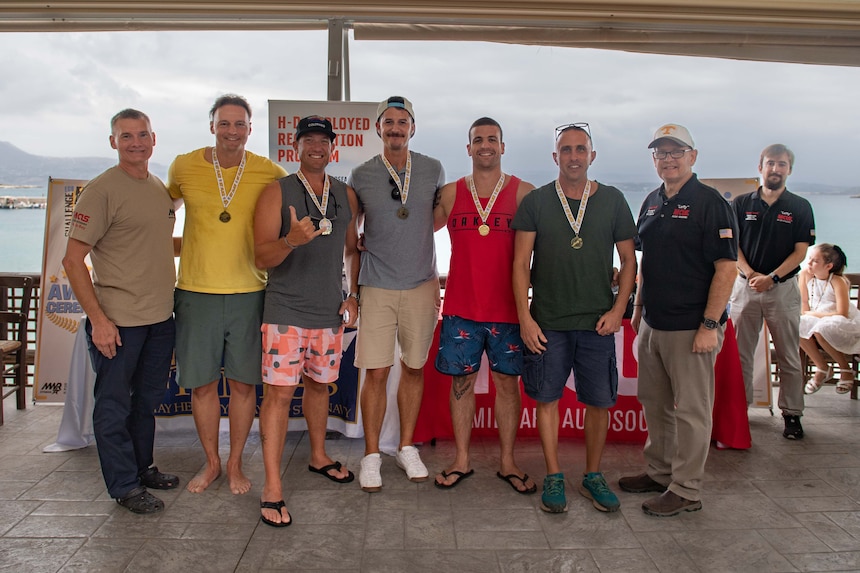 Personnel from Navy Support Activity Souda Bay Fire & Emergency Services receive medals for a first-place finish in the 20th Annual Eco-Challenge event hosted by NSA Souda Bay and organized and executed by the Morale, Welfare and Recreation team on Sept. 9, 2023.