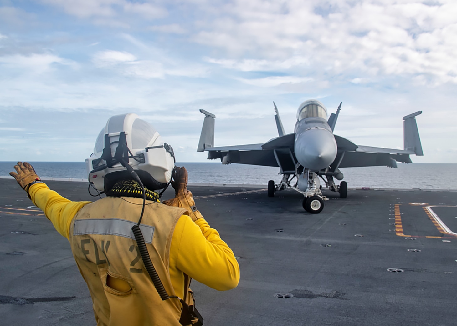 An Aviation Boatswain's Mate (Handling) aboard an aircraft carrier wears the new HPH on the flight line during a recent fleet assessment.