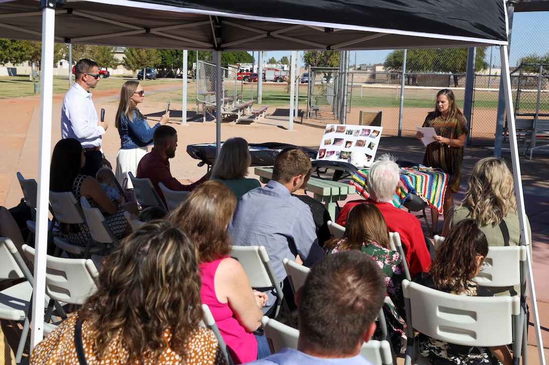 Francine Hall, Thomas Meyer’s sister, gives a speech during the re-opening of a time capsule at Thomas Meyer Memorial Field at Marine Corps Air Station Yuma, Arizona, Oct. 31, 2022. The field was dedicated to Thomas Meyer at a formal ceremony, Oct. 31, 1997, after he was struck and killed by a motor vehicle while riding a bicycle, Nov. 1, 1996. (U.S. Marine Corps photo by Lance Cpl. Jon C. Stone)