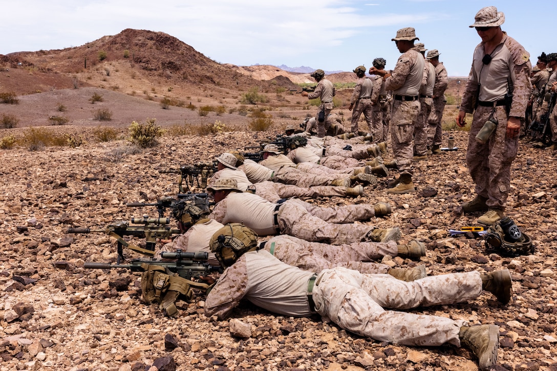 U.S. Marines assigned to Alpha Company, Battalion Landing Team 1/5, 15th Marine Expeditionary Unit, engage their targets during a battle sight zero range as part of Realistic Urban Training exercise at Yuma Proving Grounds, Arizona, Aug. 16, 2023. RUT is a land-based predeployment exercise which enhances the integration and collective capability of the Marine Air-Ground Task Force while providing the 15th MEU an opportunity to train and execute operations in an urban environment. (U.S. Marine Corps photo by Lance Cpl. Peyton Kahle)