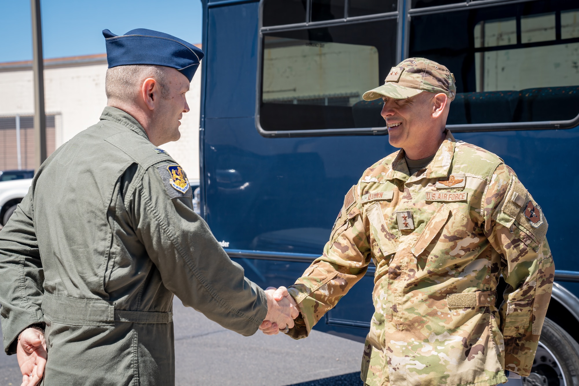 Two men shaking hands.