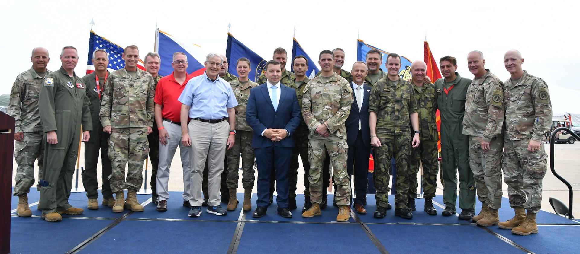 Members of the Czech delegation pose for a photo with senior leaders of the Nebraska and Texas National Guard following an Aug. 26, 2023, ceremony marking the 30th Anniversary of an enduring partnership made possible through the National Guard's State Partnership Program.
