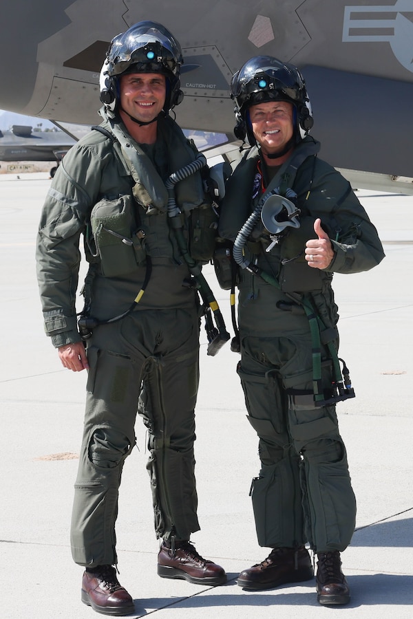 U.S. Marine Corps Brig. Gen. Robert B. Brodie, assistant wing commander, 3rd Marine Aircraft Wing (3rd MAW), right, and Lt. Col. Bijan Derakhshan, commanding officer, Marine Fighter Attack Squadron 122 (VMFA-122), 3rd MAW, they pose for a photo during Brodie visit at Marine Corps Air Station Yuma, Arizona, Aug. 29, 2023. During his visit to the air station Brodie observed operations and training at VMFA-211 and VMFA-122. (U.S. Marine Corps photo by Lance Cpl. Elizabeth Gallagher)