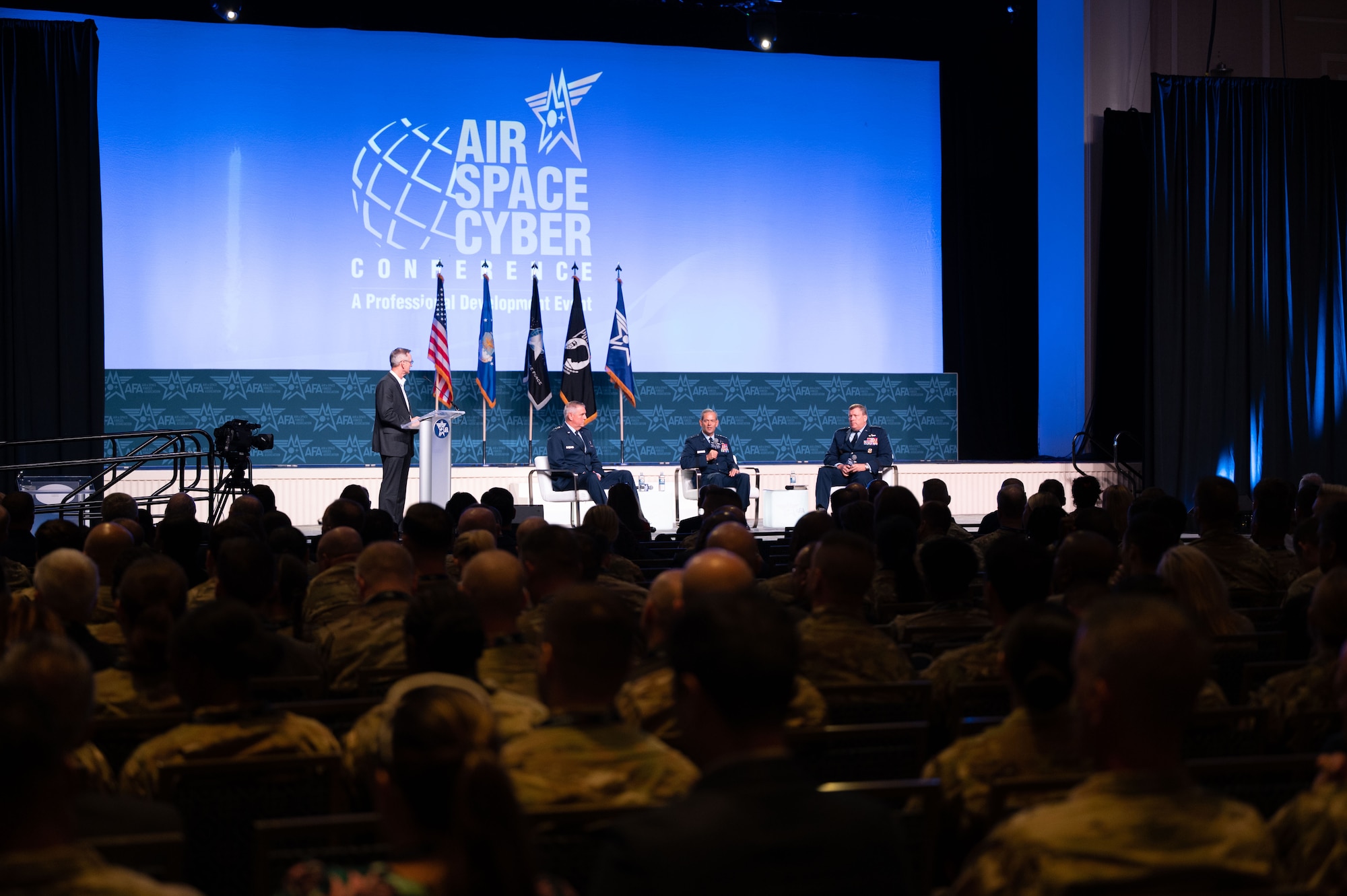 Gen. Ken Wilsbach, Pacific Air Forces commander (center), speaks on the panel ‘Ready to Compete, Fight, & Win in the Indo-Pacific’ at the Air and Space Forces Association’s Air, Space and Cyber Conference in National Harbor, Maryland, Sept. 13. Wilsbach compared PACAF’s initial operating capability (IOC) for Agile Combat Employment to the desired final state, saying that IOC had just 2 hubs and 4 spokes while FOC will encompass the entire region. He appeared on the panel with Gen. Mike Minihan, commander of Air Mobility Command, and Lt. Gen. Tony Bauernfeind, commander of Air Force Special Operations Command. (U.S. Air Force photo by Master Sgt. Gena Armstrong)