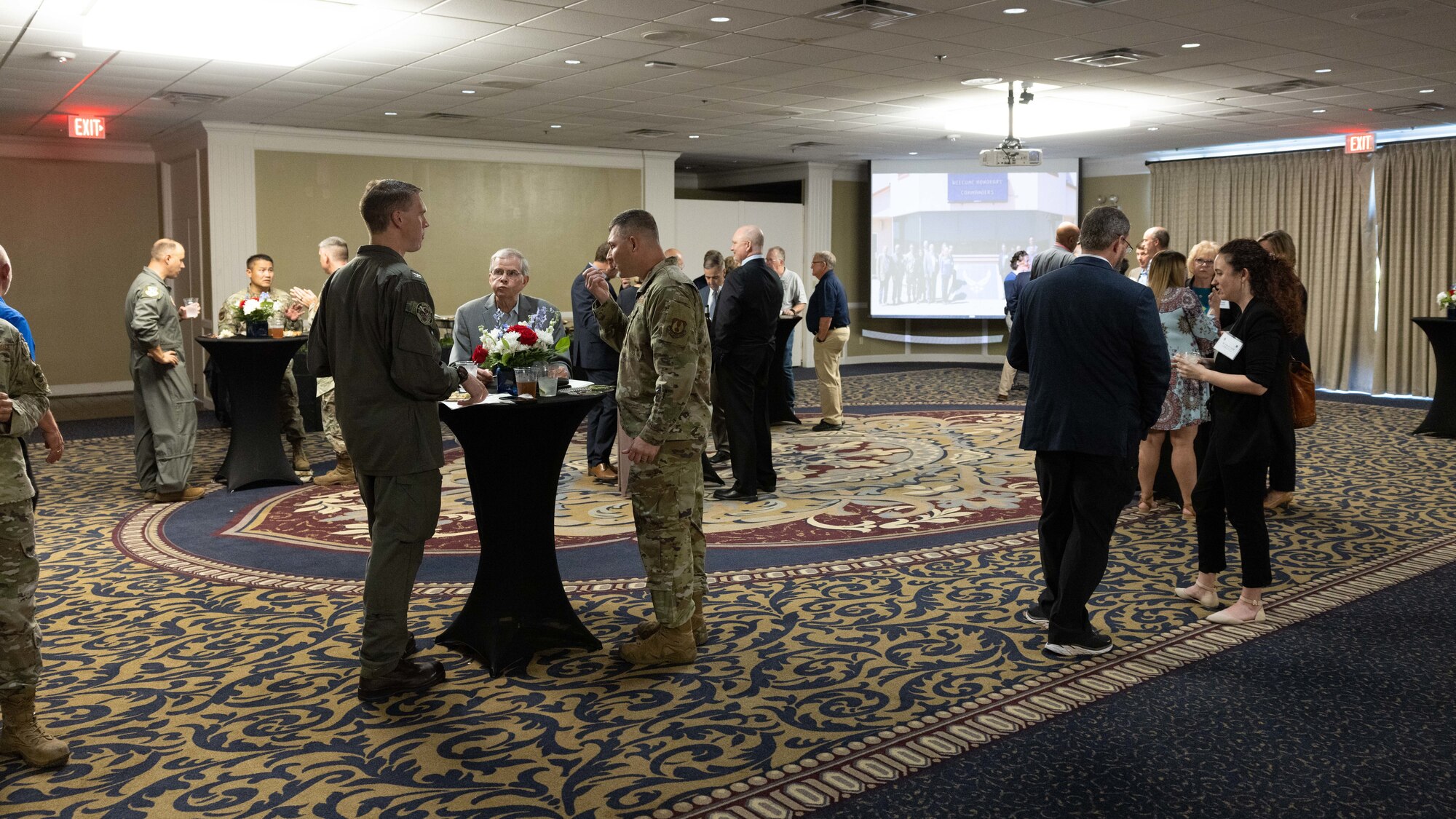 people networking at tables