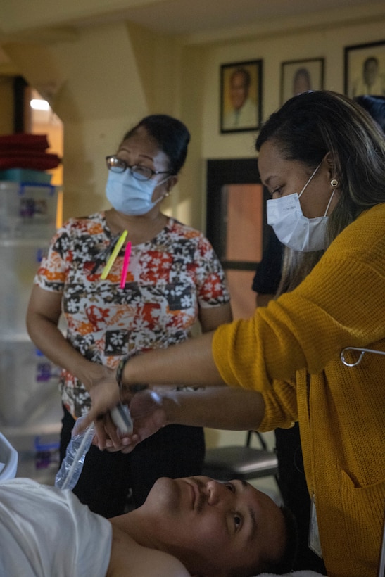 Dr. Samantha Olkeriil, an Internal Medicine Intern at Belau National Hospital, participates in point of care ultrasound training at Belau National Hospital on Koror, Republic of Palau, Sept. 8, 2023. The United States and the Republic of Palau continue to enhance interoperability by providing regional security, real-world training and community relations projects while forward deployed in the Indo-Pacific area of responsibilities during MCED – Palau 23.2. (U.S. Marine Corps photo by SSgt. David Bickel)