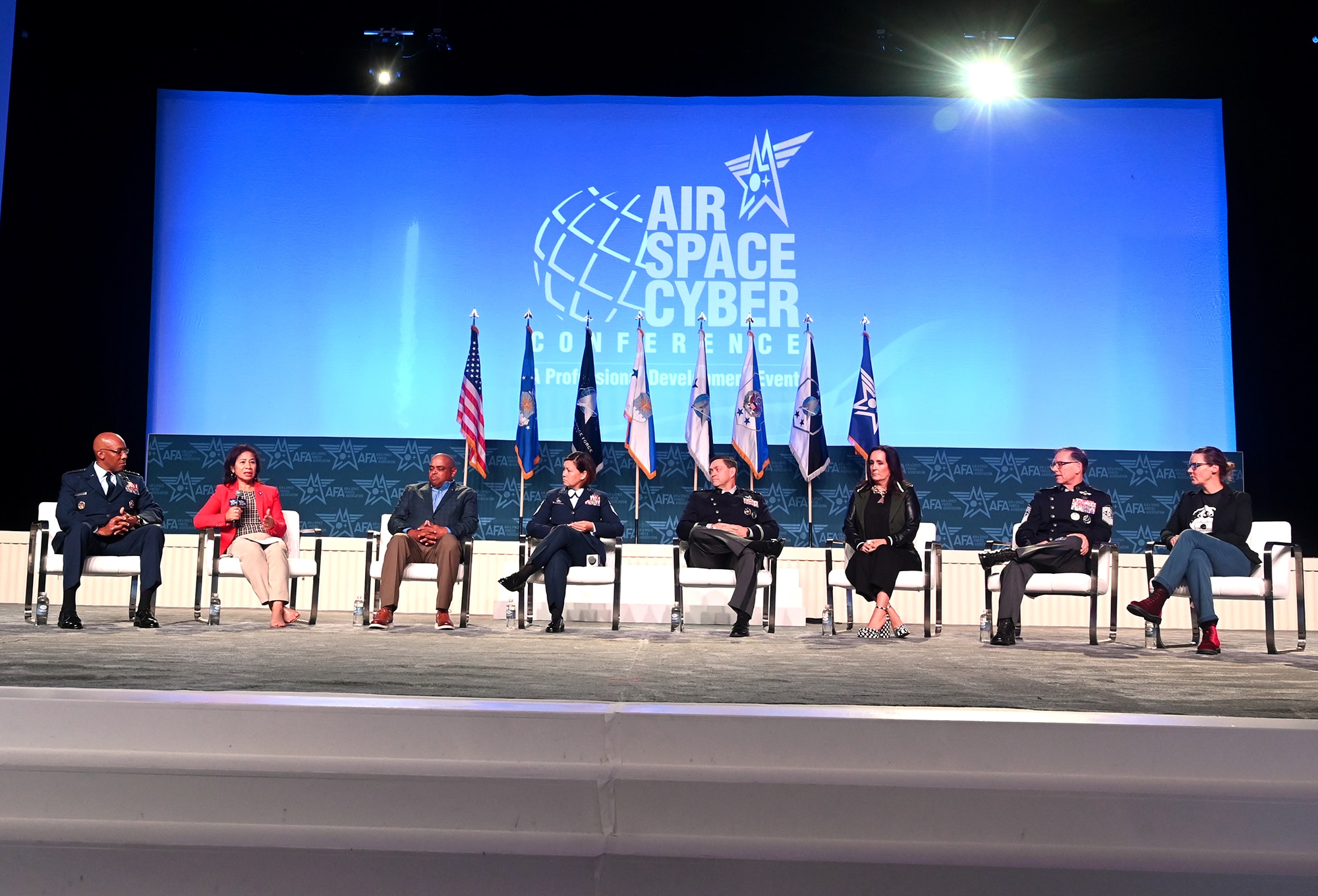 Air Force Chief of Staff Gen. CQ Brown, Jr., Mrs. Sharene Brown, Chief of Space Operations Gen. Chance Saltzman, Mrs. Jennifer Saltzman, Chief Master Sergeant of the Air Force JoAnne S. Bass, Mr. Rahn Bass, Chief Master Sergeant of the Space Force Roger Towberman and Mrs. Rachel Rush take part in a panel discussion about the Senior Leader Perspective at the Air and Space Forces Association’s Air, Space and Cyber Conference in National Harbor, Md., Sept 13, 2023. (U.S. Air Force photo by Andy Morataya)