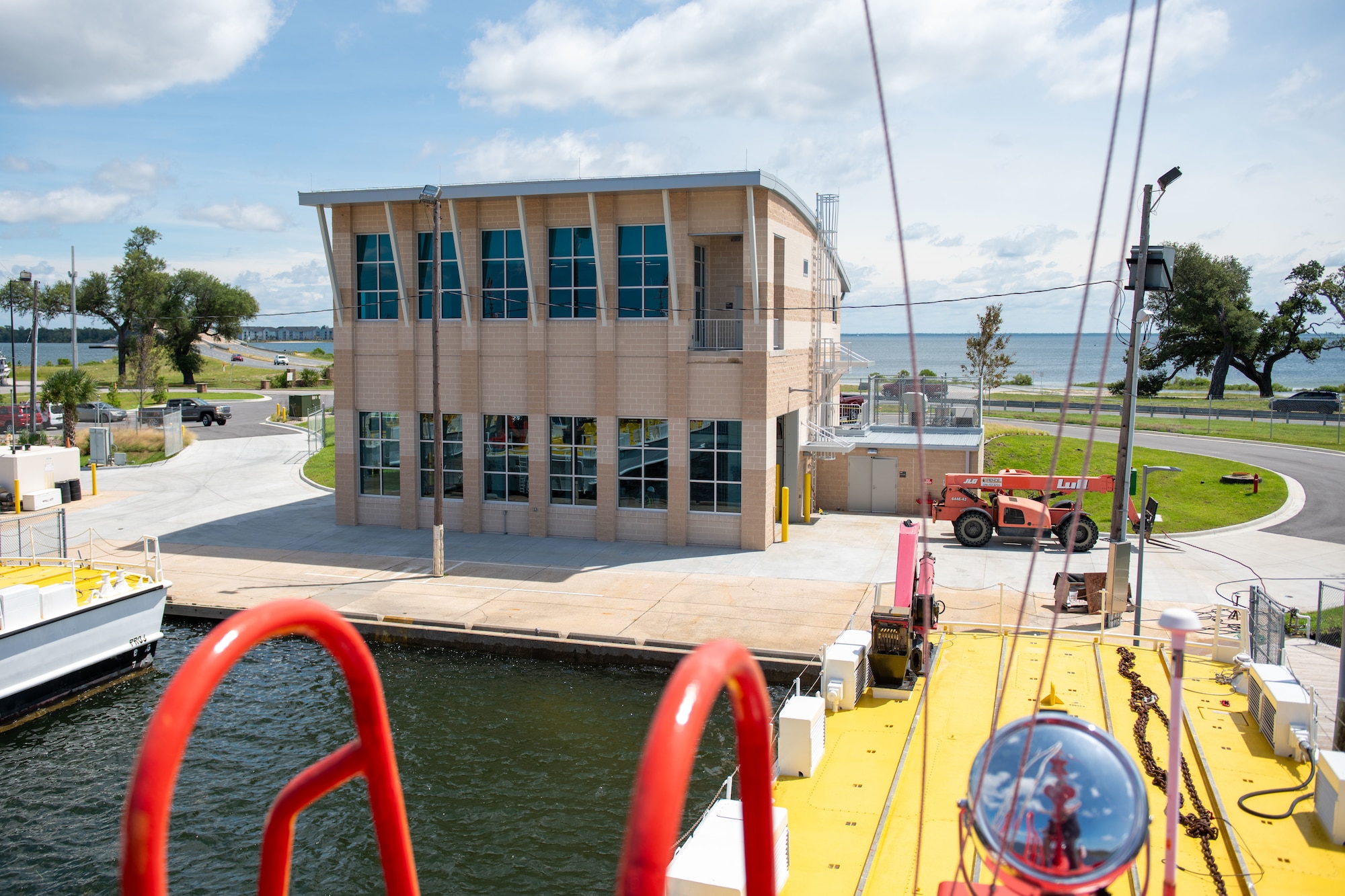 Large building located near boat dock.