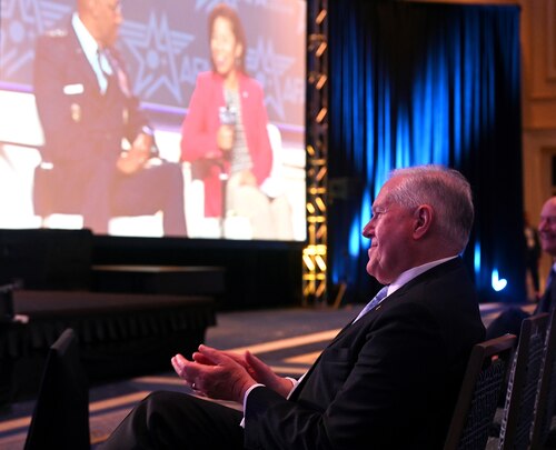 Secretary of the Air Force Frank Kendall applauds as he watches a panel discussion about the Senior Leader Perspective at the Air and Space Forces Association’s Air, Space and Cyber Conference in National Harbor, Md., Sept 13, 2023. The panel was composed of senior uniformed Air Force and Space Force leaders and their spouses. (U.S. Air Force photo by Andy Morataya)