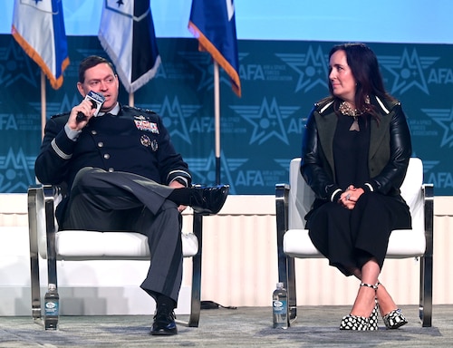 Chief of Space Operations Gen. Chance Saltzman and Mrs. Jennifer Saltzman take part in a panel discussion about the Senior Leader Perspective at the Air and Space Forces Association’s Air, Space and Cyber Conference in National Harbor, Md., Sept 13, 2023. (U.S. Air Force photo by Andy Morataya)