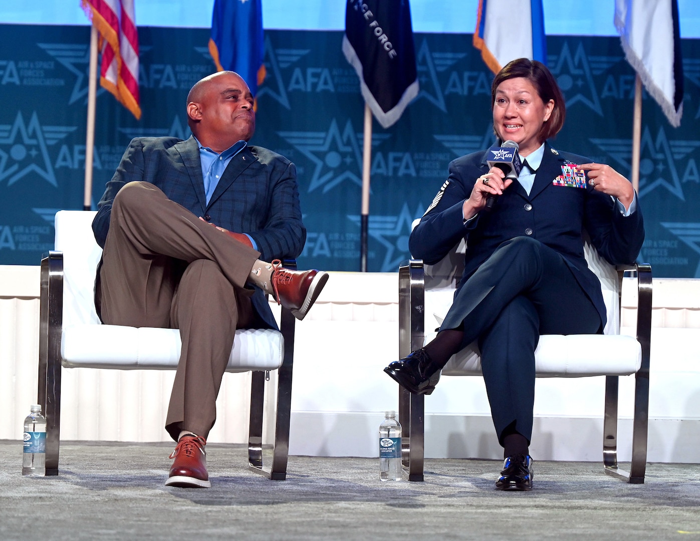 Chief Master Sergeant of the Air Force JoAnne S. Bass and Mr. Rahn Bass take part in a panel discussion about the Senior Leader Perspective at the Air and Space Forces Association’s Air, Space and Cyber Conference in National Harbor, Md., Sept 13, 2023. (U.S. Air Force photo by Andy Morataya)