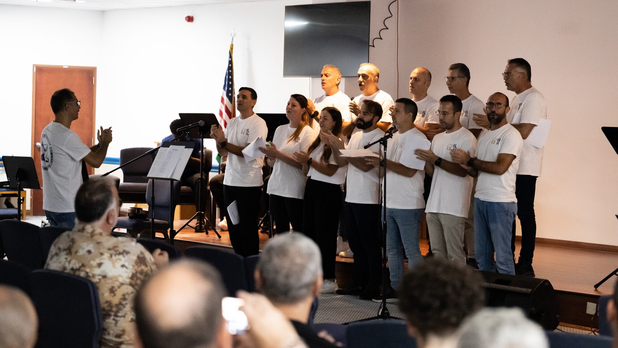 Members from the Italian choir perform a song together during a coalition worship event at the chapel at Ali Al Salem Air Base, Kuwait, Sept. 13, 2023. U.S. and partner nation forces from across the base came together for a night of song and prayer to bolster their spiritual fitness and cultivate the inclusiveness that power our enduring partnerships. (U.S. Air Force photo by Staff Sgt. Kevin Long)