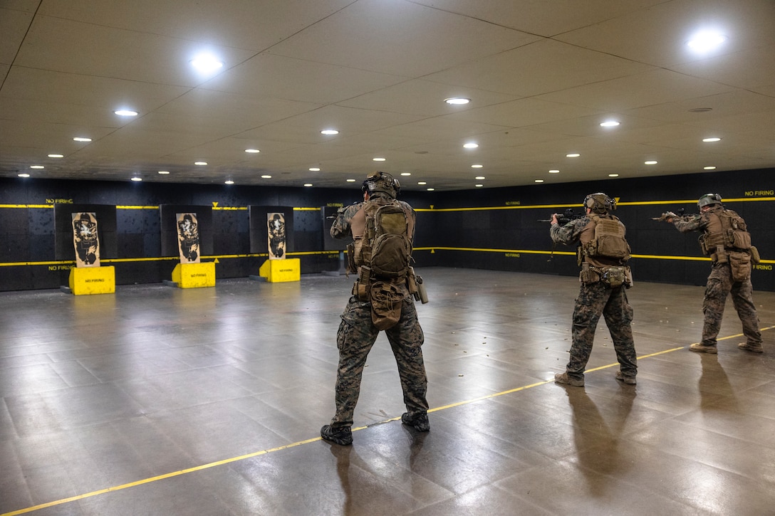 U.S. Marines with Marine Rotational Force-Southeast Asia (MRF-SEA), I Marine Expeditionary Force, conduct live-fire static drills with their M4A1 service rifles during Exercise Valiant Mark 2022 at the Multi-Mission Range Complex on the Pasir Laba Camp, Singapore, Dec. 2, 2022. Valiant Mark is an annual, bilateral training exercise designed to enhance interoperability, build mutual defense capabilities, and strengthen military-to-military relationships between the U.S. Marine Corps and Singapore Armed Forces. MRF-SEA is an operational model developed by Marine Corps Forces Pacific that postures scalable I Marine Expeditionary Forces west of the International Date Line, conducts a series of planned subject matter experts exchanges, and advances security objectives shared with our Allies and Partners. (U.S. Marine Corps photo by Sgt. Ryan H. Pulliam)