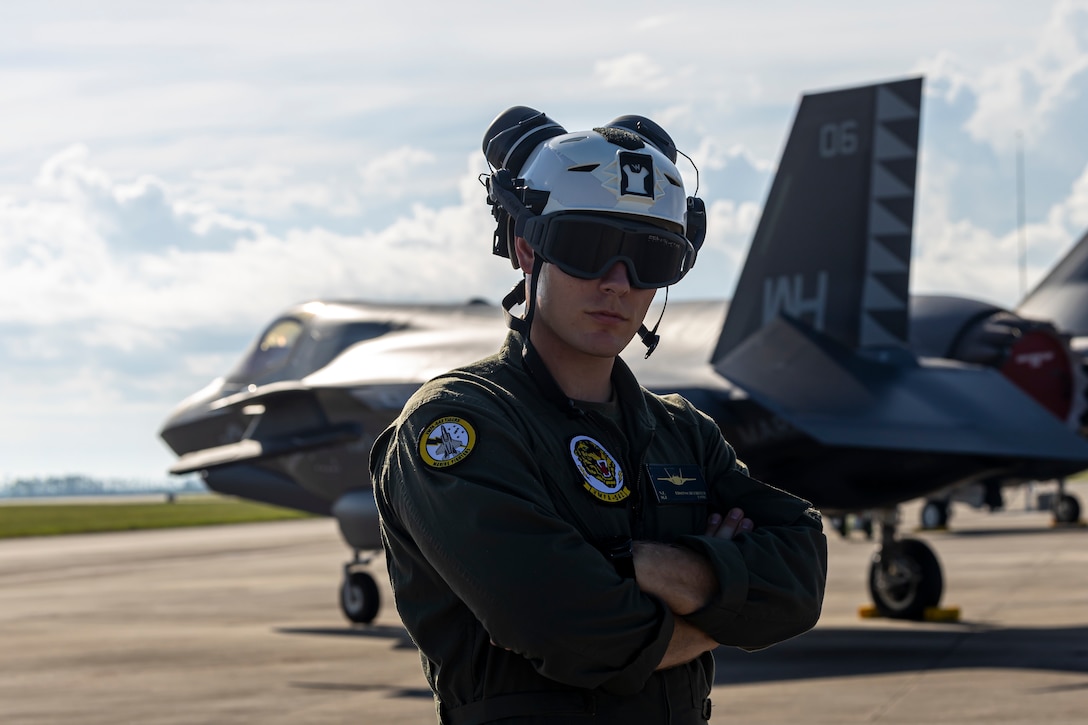 U.S. Marine Corps Sgt. Nathyn Edson-Schuerfeld, an F-35B Lightning II pilot with Marine Fighter Attack Squadron (VMFA) 542, poses for a photo at Tyndall Air Force Base, Florida, Sept. 12, 2023. The Naval Weapon System Evaluation Program allowed VMFA-542 to safely conduct the loading and firing of live missiles at threat-realistic targets to test the squadrons' ability, flexibility, and procedures while repositioned in unfamiliar locations. VMFA-542 is a subordinate unit of 2nd Marine Aircraft Wing, the aviation combat element for II Marine Expeditionary Force. (U.S. Marine Corps by Cpl. Christopher Hernandez)