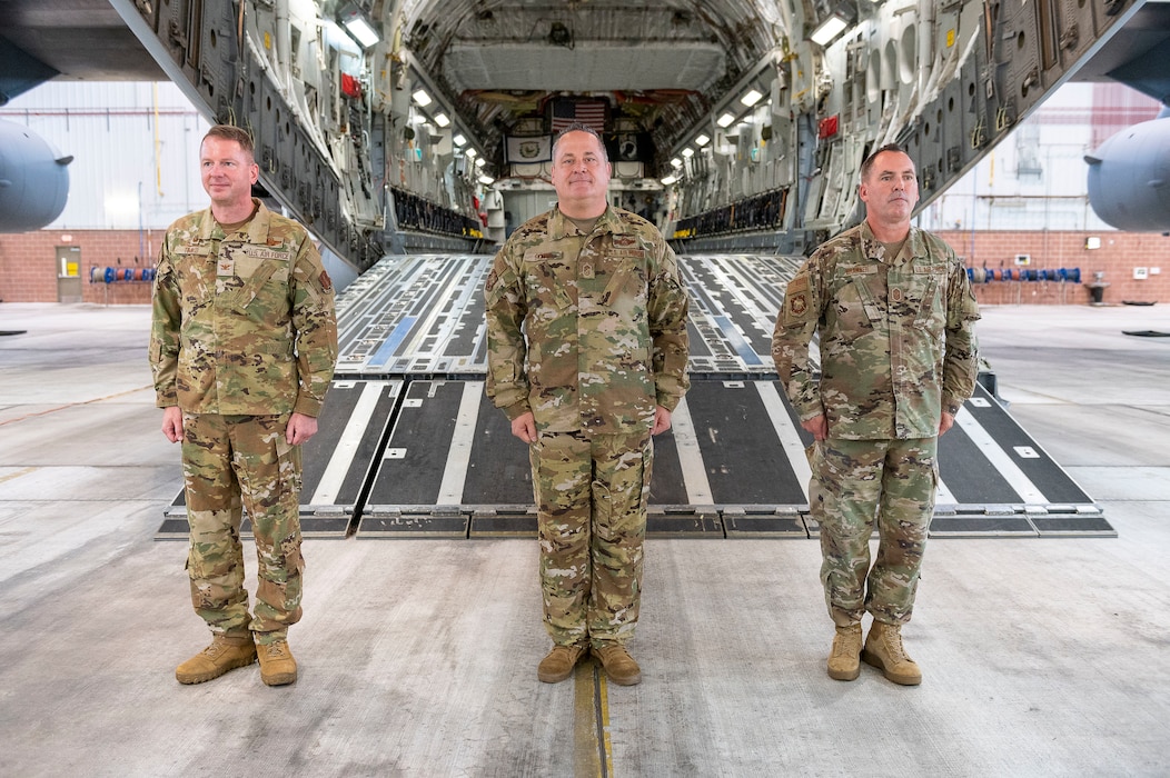 U.S. Air Force Col. Martin Timko, 167th Airlift Wing commander, Chief Master Sgt. Mark Snyder, 167th Airlift Wing command chief, and Chief Master Sgt. Troy Brawner, outgoing 167th Airlift Wing command chief, stand during a change of responsibility ceremony at the 167th Airlift Wing, Shepherd Field, Martinsburg, West Virginia, Sept. 9, 2023