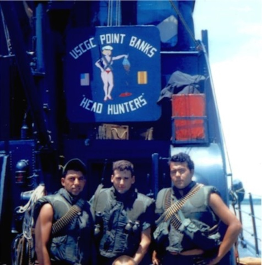 Engineman Larry Villarreal and shipmates in flak vests on board Point Banks. (U.S. Coast Guard)