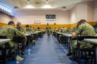 Sailors take a Navy-wide advancement exam at Fleet Activities Yokosuka.