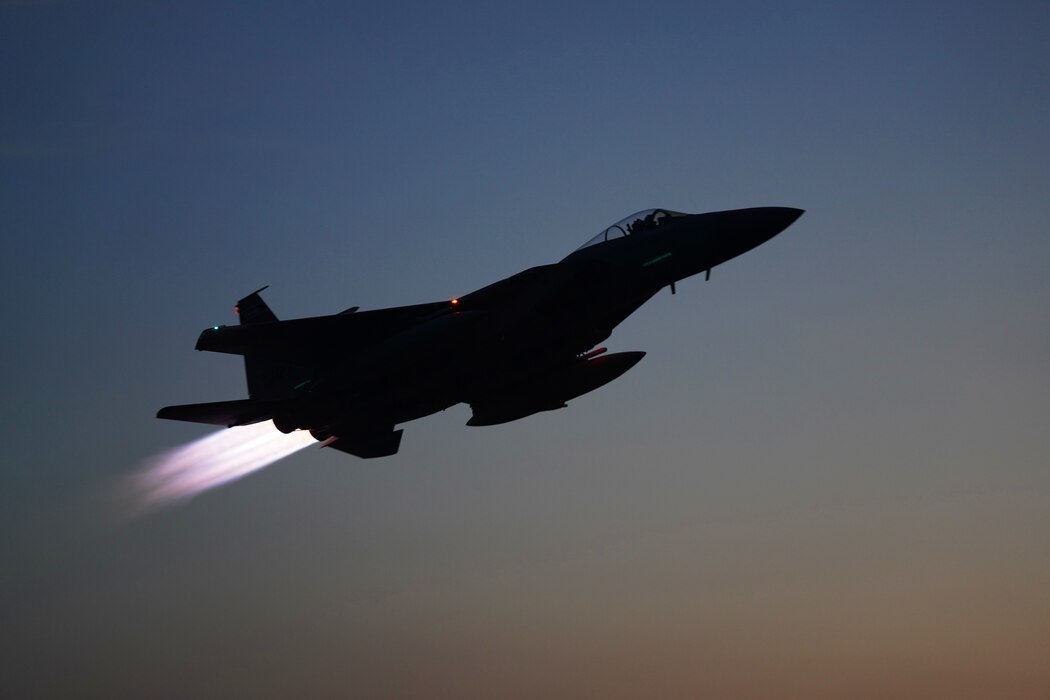 A U.S. Air Force F-15C Eagle assigned to the Florida Air National Guard, flies overhead