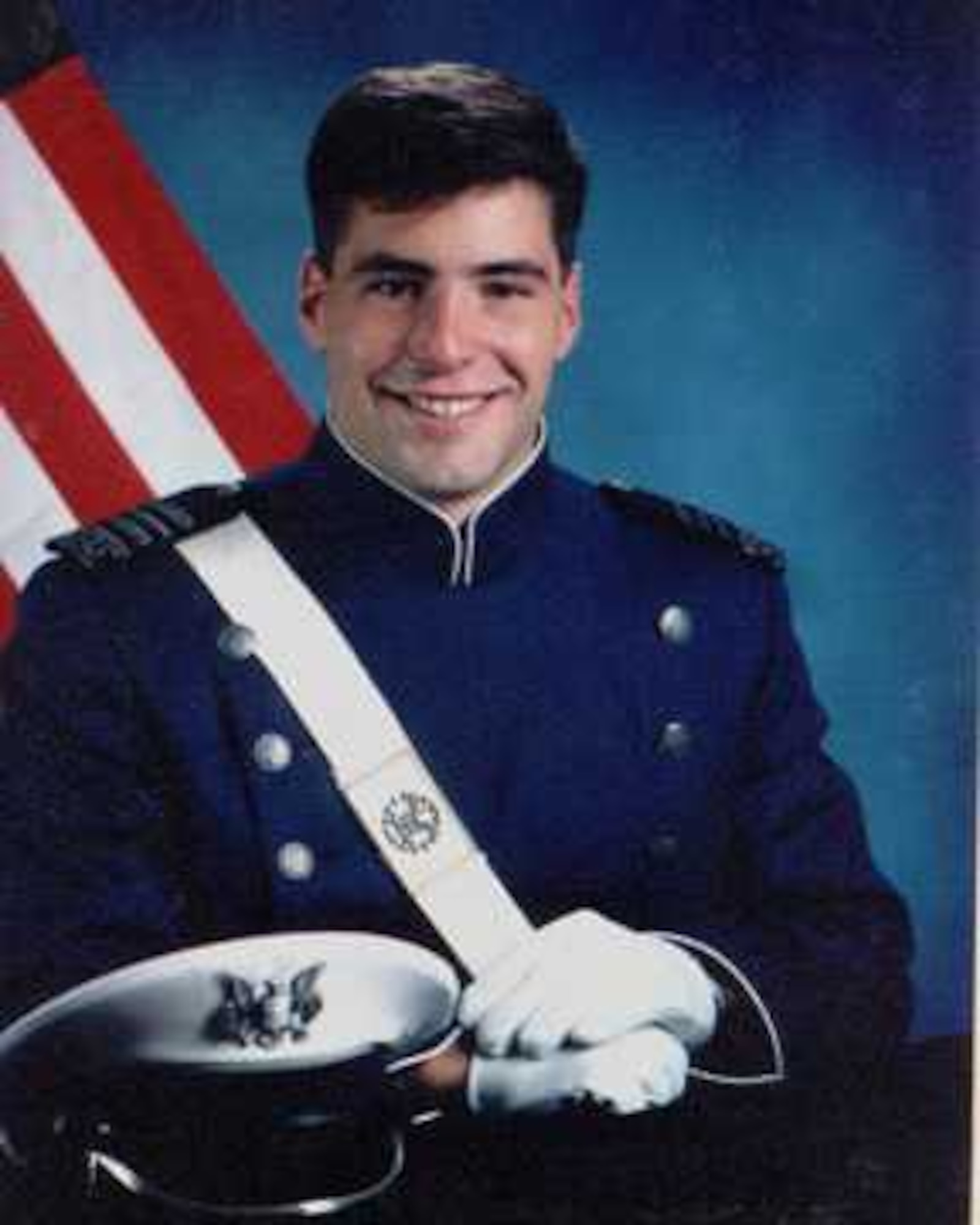 U.S. Air Force 1st Lt. Brice Simpson, a Luke Air Force Base Distinguished Graduate and an Air-to-Ground "Top Gun," poses for an official photo