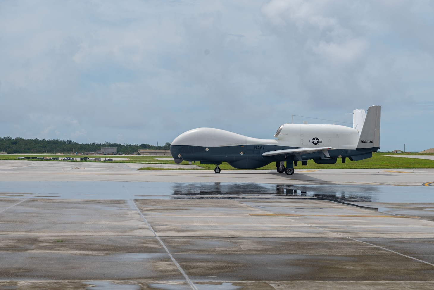 An MQ-4C Triton Unmanned Aircraft System (UAS) assigned to Unmanned Patrol Squadron 19 (VUP-19), taxis after landing on Andersen Air Force Base. VUP-19, the first Triton unmanned aircraft systems squadron, will operate and maintain aircraft in Guam as part of the MQ-4C’s initial operational capability (IOC).