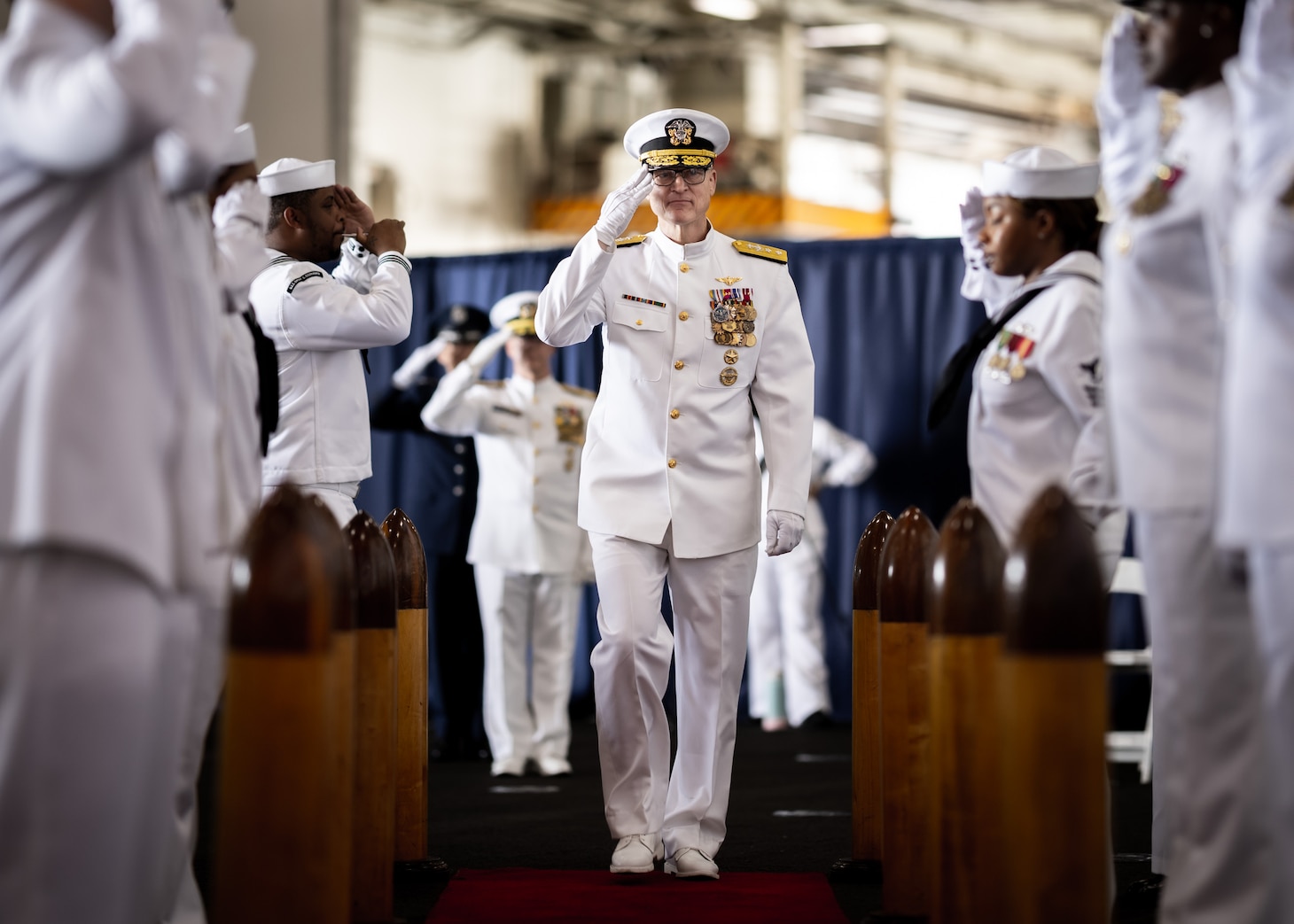 Rear Adm. Michael A. Wettlaufer, commander, Military Sealift Command (MSC), is rung aboard USS Dwight D. Eisenhower (CVN 69) during MSC’s change of command ceremony held on board the ship, Sept. 8, 2023.