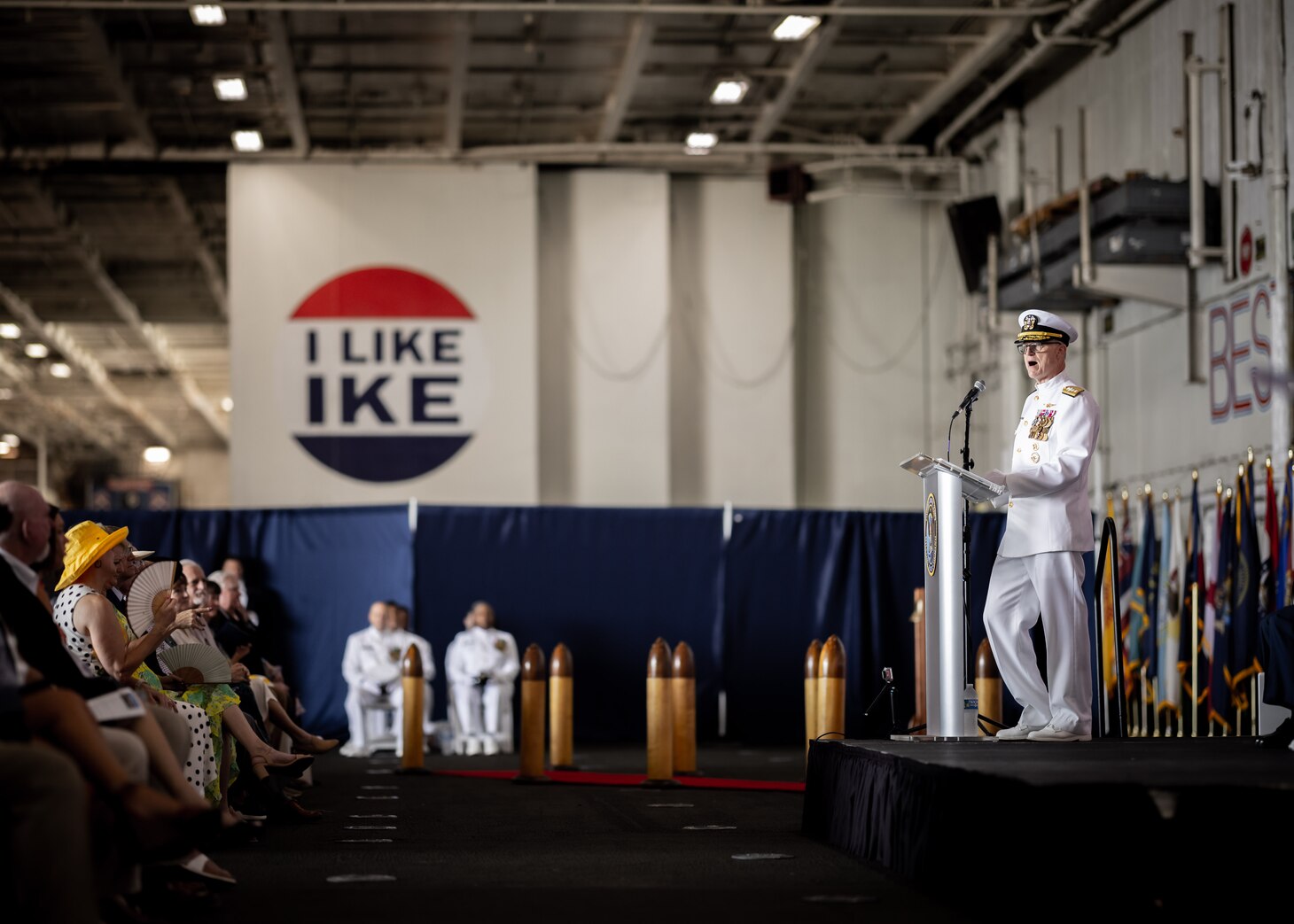 Rear Adm. Michael A. Wettlaufer, commander, Military Sealift Command (MSC), delivers remarks aboard USS Dwight D. Eisenhower (CVN 69) during MSC’s change of command ceremony held on board the ship, Sept. 8, 2023.