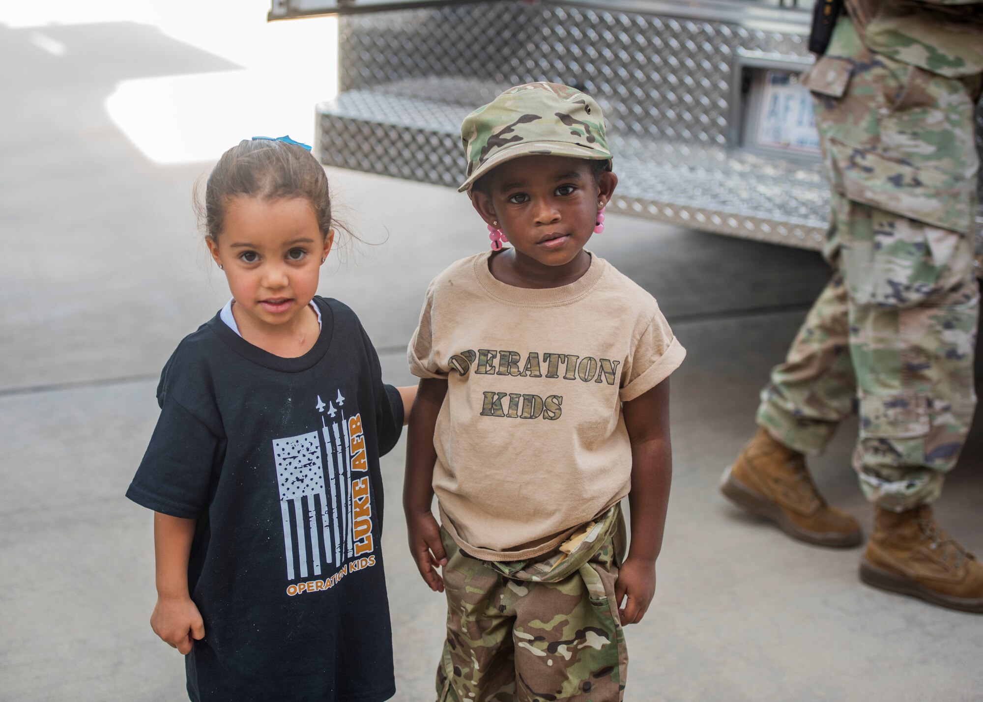 Two U.S. Air Force children pose for a photo during the 15th annual Operation KIDS event Sept. 9, 2023, at Luke Air Force Base, Arizona.