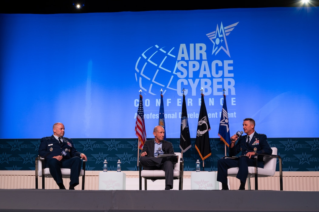U.S. Air Force Lt. Gen. Steven S. Nordhaus, right, commander, Continental U.S. North American Aerospace Defense Command Region – 1st Air Force (U.S. Air Forces Northern and U.S. Air Forces Space), speaks during a panel alongside Maj. Gen. Duke A. Pirak, left, deputy director, Air National Guard, and retired Gen. James M. Holmes, former commander, Air Combat Command, at the 2023 Air, Space & Cyber Conference in the National Harbor, Maryland, Sep. 13, 2023.